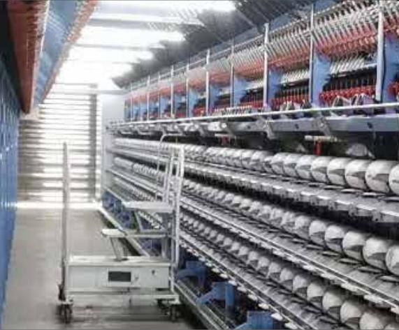 Circular knitting machines producing sports jersey fabric in Fujian factory